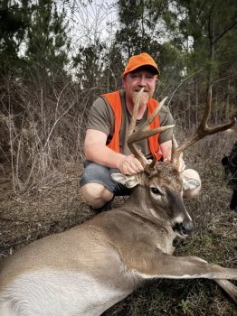 Matt Hovis with a nice buck in 80 degree weather.